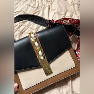 Aldo Elegant Black and Brown Women's Bag with red scarf